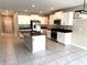Kitchen featuring stainless steel appliances, granite countertops and ample cabinet space at 5430 Amaryllis Garden St, Apollo Beach, FL 33572