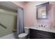 The bathroom features a single sink vanity, toilet, shower and bath. Great functionality in a compact space at 5625 15Th Ave W, Bradenton, FL 34209