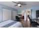 Charming bedroom with natural light, hardwood floors, and ample closet space for comfortable living at 5625 15Th Ave W, Bradenton, FL 34209