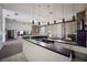 Large common room featuring a full bar and sink area, ideal for social gatherings and events at 5625 15Th Ave W, Bradenton, FL 34209