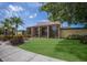 Welcome to the community center, featuring stone accents, manicured landscaping and ample street parking at 5625 15Th Ave W, Bradenton, FL 34209