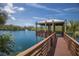 Relax on the water in this beautiful gazebo, complete with a viewing deck and water fountain feature at 5625 15Th Ave W, Bradenton, FL 34209