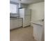 Kitchen featuring white appliances, white cabinets and granite countertops at 5625 15Th Ave W, Bradenton, FL 34209