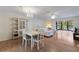 Spacious living room and dining area with views to the outside and laminate floors at 5625 15Th Ave W, Bradenton, FL 34209