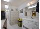 Functional locker room featuring lockers, a vanity, and a mirror at 5625 15Th Ave W, Bradenton, FL 34209