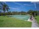 Enjoy outdoor activities with the community shuffleboard courts, surrounded by a lush green lawn at 5625 15Th Ave W, Bradenton, FL 34209