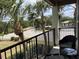 Balcony with comfortable seating offers views of the community, creating a relaxing outdoor space at 5741 Soldier Cir # 202, Sarasota, FL 34233