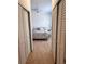 Bedroom featuring closets, bright natural light, and a stylish ceiling fan at 5741 Soldier Cir # 202, Sarasota, FL 34233