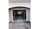 Spacious garage interior featuring ample storage space and potential for a workshop area at 5741 Soldier Cir # 202, Sarasota, FL 34233