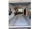 Spacious empty garage with painted walls, concrete floor and a window at 5741 Soldier Cir # 202, Sarasota, FL 34233