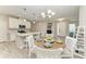 This dining area offers a blend of casual comfort and charm, adjacent to the kitchen at 5957 Amberly Dr, Bradenton, FL 34208