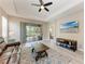 Living room features a sliding glass door, offering seamless indoor-outdoor living and natural light at 5957 Amberly Dr, Bradenton, FL 34208