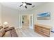 Office space with natural light, ceiling fan, and a view to living spaces, perfect for work or relaxation at 5957 Amberly Dr, Bradenton, FL 34208