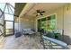 Inviting screened patio with outdoor dining and seating, perfect for enjoying the view at 5957 Amberly Dr, Bradenton, FL 34208