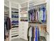 Organized walk-in closet with ample shelving, drawers, and hanging space for clothing and accessories at 5957 Amberly Dr, Bradenton, FL 34208