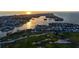 Luxury coastal community with gulf access and golf course views with water canals and stunning sun reflections at 621 Ivanhoe Ln, Holmes Beach, FL 34217