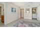 Bedroom featuring tile flooring, breezy ceiling fan, closet and art on the walls at 621 Ivanhoe Ln, Holmes Beach, FL 34217