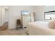 Well-lit bedroom with a comfy bed, a dresser, and a mirror on display at 6248 Fish Eagle Ct, Nokomis, FL 34275