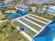 Aerial view of the community bocce ball courts near the amenity center, pool and playground at 6248 Fish Eagle Ct, Nokomis, FL 34275