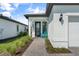 Inviting front porch with a brick pathway leading to the entrance of this beautiful property at 6248 Fish Eagle Ct, Nokomis, FL 34275