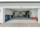 Spacious garage with epoxy flooring and offering ample storage area for all needs at 6248 Fish Eagle Ct, Nokomis, FL 34275