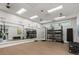 Well-equipped gym featuring free weights, resistance bands, and mirrored walls at 6248 Fish Eagle Ct, Nokomis, FL 34275