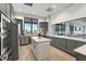 Modern kitchen featuring stainless steel appliances, ample counter space, and an island at 6248 Fish Eagle Ct, Nokomis, FL 34275