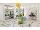 Lobby with marble floors, modern decor, and natural light at 6248 Fish Eagle Ct, Nokomis, FL 34275