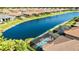 Waterfront homes along a scenic canal featuring private screened pools, tile roofs, and lush tropical landscaping at 6290 Mesa Gln, Bradenton, FL 34203