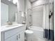 Clean bathroom featuring a combination tub and shower, modern vanity, and neutral finishes at 6290 Mesa Gln, Bradenton, FL 34203