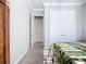 Neutral bedroom featuring doorway to other rooms and closet space at 6290 Mesa Gln, Bradenton, FL 34203