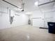 Garage featuring epoxy floors, storage, and easy access at 6290 Mesa Gln, Bradenton, FL 34203