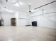 Well-organized garage space with shelving and room for storage at 6290 Mesa Gln, Bradenton, FL 34203