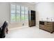 Bright office space features tile floors, natural light from the window, and attractive shelving and cabinet at 6290 Mesa Gln, Bradenton, FL 34203