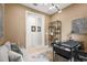 Bright home office featuring sleek furnishings, contemporary decor, and ample natural light at 6295 Crested Eagle Ln, Nokomis, FL 34275
