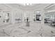 An elegant lobby showcasing a marble floor and contemporary decor at 6295 Crested Eagle Ln, Nokomis, FL 34275