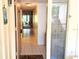 Hallway with tile floor and a glass-paneled door at 6462 Wild Oak Bay Blvd # 245, Bradenton, FL 34210
