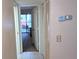 Hallway view of the property with a sliding door entrance to the outdoor patio at 6462 Wild Oak Bay Blvd # 245, Bradenton, FL 34210