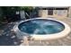 Relax in the community hot tub with nearby signage about maximum depth and spa rules at 6462 Wild Oak Bay Blvd # 245, Bradenton, FL 34210