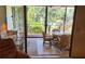 Enclosed patio with stylish chairs, and lush green outdoors at 6462 Wild Oak Bay Blvd # 245, Bradenton, FL 34210