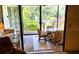 Enclosed patio with stylish chairs, and lush green outdoors at 6462 Wild Oak Bay Blvd # 245, Bradenton, FL 34210