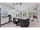 Spacious kitchen with an island, stainless steel appliances, and plenty of cabinet space at 7985 Manasota Key Rd, Englewood, FL 34223