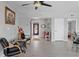 Bright living room with modern furnishings and a tiled floor at 7985 Manasota Key Rd, Englewood, FL 34223