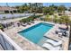 Inviting pool area complete with sun loungers for relaxation at 7985 Manasota Key Rd, Englewood, FL 34223