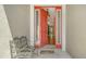 Charming entrance with a bench, decorative front door, and 'Wipe Your Paws' welcome mat at 8019 Indigo Ridge Ter, Bradenton, FL 34201