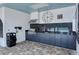 Outdoor kitchen with stainless steel grill, countertop, and a covered vent at 8019 Indigo Ridge Ter, Bradenton, FL 34201