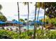 Community water park with chairs and lounging areas surrounded by trees at 8019 Indigo Ridge Ter, Bradenton, FL 34201