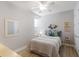 Cozy bedroom featuring neutral tones, a comfortable queen-sized bed, and stylish decor for a peaceful retreat at 8045 Tybee Ct # 8045, University Park, FL 34201