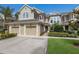 Charming townhouse featuring a two-car garage and beautiful landscaping at 8045 Tybee Ct # 8045, University Park, FL 34201