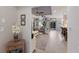 Bright living room with tile flooring, ceiling fans, and sliding glass doors leading to the outdoors at 8045 Tybee Ct # 8045, University Park, FL 34201